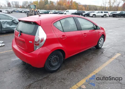 2014 Toyota Prius C One from USA, damaged, VIN JTDKDTB37E1068836